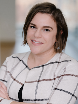 a head and shoulders image of AnnaLynn Williams, PhD, in a white and tan plaid shirt. 